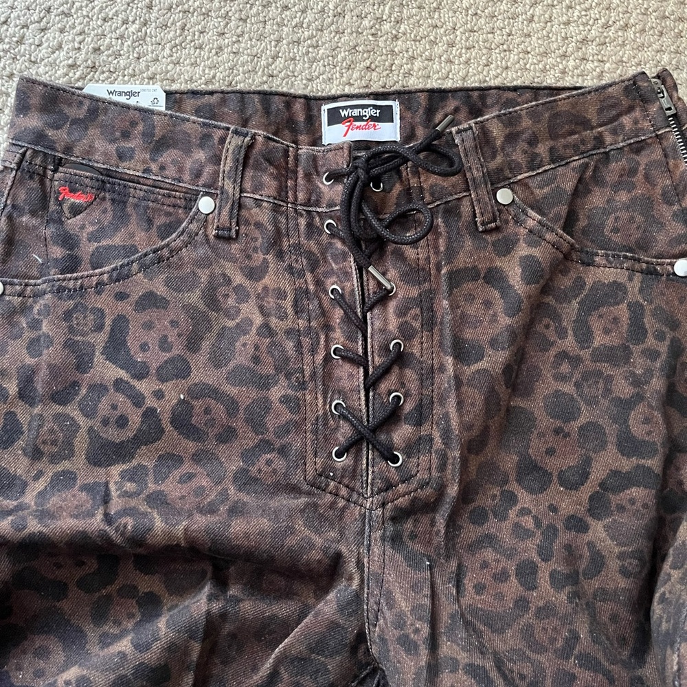wrangler X fender cheetah jeans.
